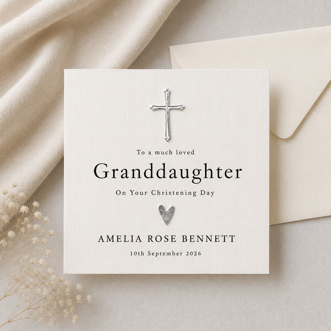 Personalised granddaughter christening card with silver cross and heart on ivory linen card — typographic serif design