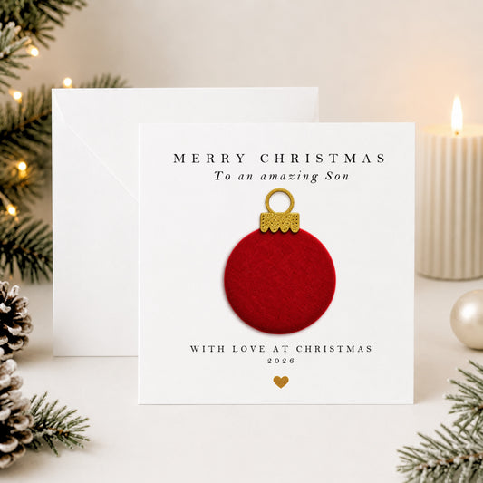 Personalised son Christmas card with hand-applied red velvet bauble on luxury white card — handmade design by Whisk & Whirl Designs