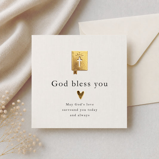God Bless You card with gold metallic leaf Bible and heart embellishment on ivory linen card stock