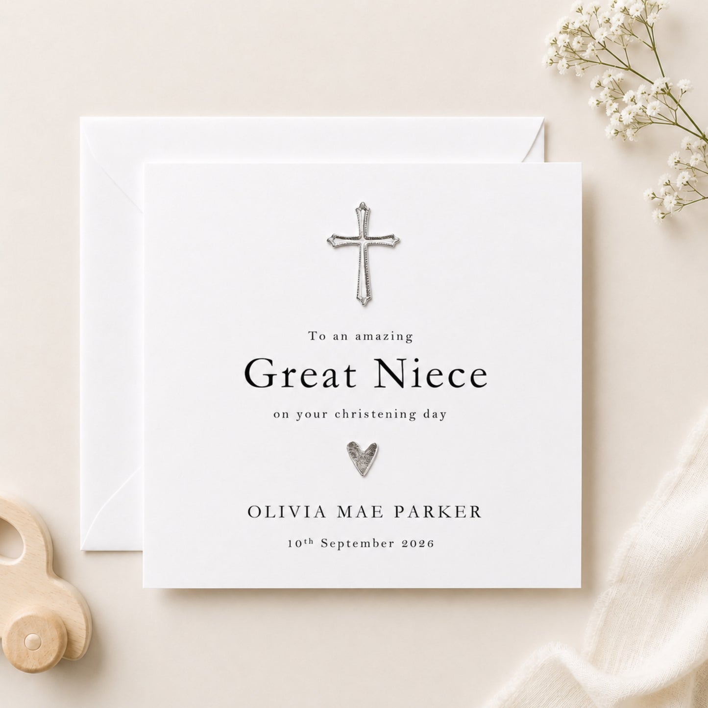 Personalised great niece christening card with silver cross embellishment on white card — typographic serif design