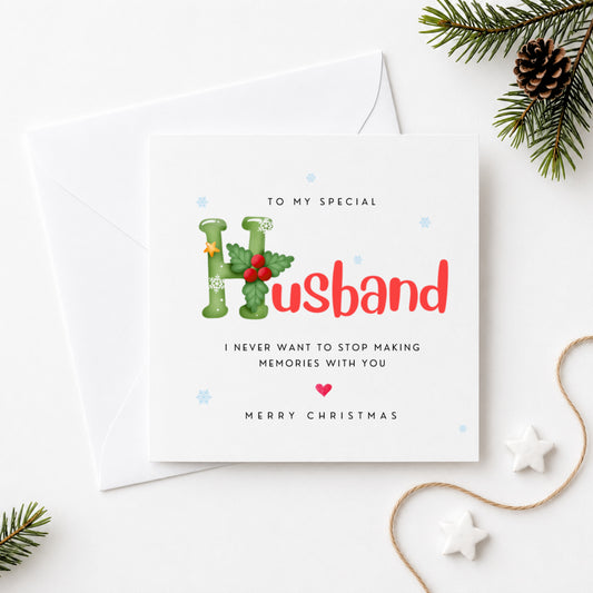 Christmas card for Husband featuring festive holly illustrated H with the words To My Special Husband I Never Want to Stop Making Memories With You Merry Christmas, white envelope