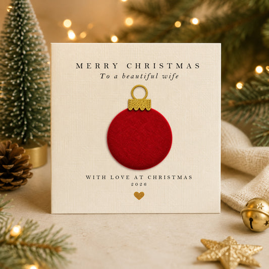 Personalised wife Christmas card with hand-applied red velvet bauble on luxury ivory card — handmade design by Whisk & Whirl Designs, sent with an ivory envelope